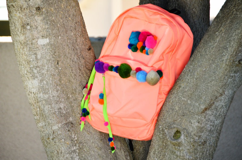 DIY pom pom backpack